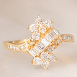 Anello vintage in oro giallo 14K con diamanti di taglio brillante e di taglio baguette (0.75ctw ca.), anni ‘70/‘80