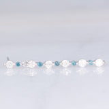 Orecchini pendenti vintage in oro bianco 18K con diamanti bianchi e blu (0.70ctw)
