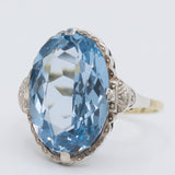 Anello da cocktail Art Déco in oro giallo 14K e argento con spinello azzurro (7.50ct ca.), anni ‘30