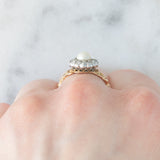 Anello a margherita antico in oro giallo 14K e argento con perla bianca e diamanti di taglio rosetta (0.13ctw ca.), primi del ‘900