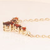 Collier vintage in oro giallo 8K con granati (1ctw ca.), anni ‘60/‘70