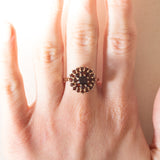 Anello a margherita vintage in oro giallo 9K con granati, anni ‘70