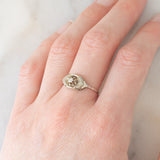 Solitario Art Déco in oro bianco 14K con diamante di taglio brillante (0.05ct ca.), anni ‘30