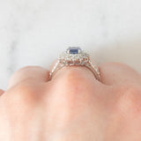 Anello a margherita vintage in platino con zaffiro (1.20ct) e diamanti (0.80ctw), anni ‘90