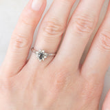 Anello a margherita vintage in platino con zaffiro (0.45ct ca.) e diamanti (0.14ctw ca.), anno 2006