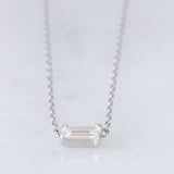 Collana vintage in platino con diamante di taglio smeraldo (0.30ct)