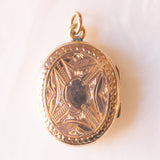 Ciondolo portafoto antico di forma ovale con lamina in oro giallo 9K su metallo e con smalti blu, primi del ‘900