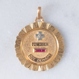 Ciondolo vintage “Plus qu’hier moins que demain” in oro giallo 18K con diamante e rubini