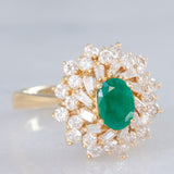 Anello ballerina vintage in oro giallo 14K con smeraldo (0.50ct ca.) e diamanti di taglio brillante e tapered (0.96ctw ca.), anni ‘80