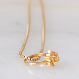 Collana vintage con ciondolo ad anello a margherita in oro giallo 18K con quarzo citrino e diamanti, anni ‘80