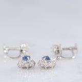 Orecchini pendenti a margherita vintage in platino con zaffiri (0.67ctw) e diamanti di taglio brillante (0.64ctw), anni ‘80/‘90