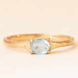 Anello solitario vintage in oro giallo 9K con topazio azzurro (0.35ct ca.), anno 1989
