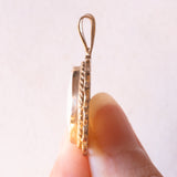Collana vintage con catenina in oro giallo 9K e con ciondolo in oro giallo 9K con opale (3ct ca.), anni ‘70