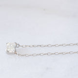 Collana vintage in platino con diamante di taglio smeraldo (0.30ct)