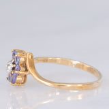 Anello contrarier con fiore in oro giallo 9K con tanzaniti (0.36ctw ca.) e diamante, anni ‘90