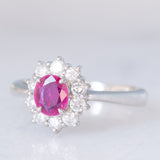 Anello a margherita vintage in platino con rubino (0.33ct) e diamanti (0.57ctw), anni ‘70