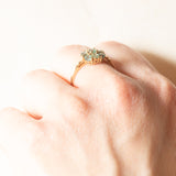 Anello a fiore moderno in oro giallo 9K con topazi verdi trattati (0.60ctw ca.), anno 2005