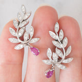 Orecchini vintage in oro bianco 18K con rubini (0.80ctw ca.) e diamanti (1ctw ca.), anni ‘90