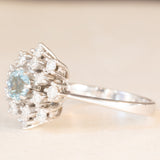 Anello a fiocco di neve vintage in oro bianco 14K con acquamarina (0.50ct ca.) e diamanti (0.70ctw ca.), anni ‘70