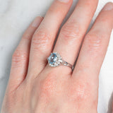 Anello a margherita vintage in platino con acquamarina (0.93ct) e diamanti (0.29ctw), anni ‘80