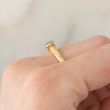 Solitario in oro giallo 9K con smeraldo (0.33ct)