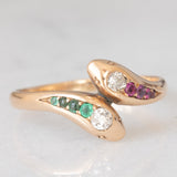 Anello contrarier antico a doppio serpente in oro giallo 14K con smeraldi, rubini e diamanti di taglio vecchio (0.16ctw ca.), anni ‘20