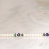 Braccialetto vintage con perle bianche, lapislazzuli, malachite e con dischi e chiusura in oro giallo 14K, anni ‘70