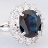 Anello a margherita vintage in platino con zaffiro (4.30ct) e diamanti (1.05ctw), anni ‘80