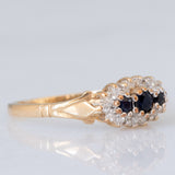 Anello vintage in oro giallo 9K con zaffiri (0.20ctw ca.) e diamanti (0.18ctw ca.), anni ‘70/‘80