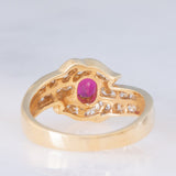 Anello a margherita vintage in oro giallo 18K con rubino (0.51ct) e diamanti (0.41ctw), anni ‘80/‘90