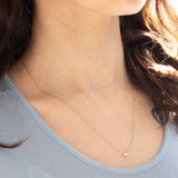 Collana vintage in platino con diamante di taglio smeraldo (0.30ct)