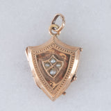 Ciondolo portafoto antico a forma di scudo in oro giallo 9K con perline bianche, primi del ‘900