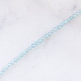 Collana moderna con acquamarine, perla bianca e oro giallo 14K
