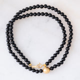 Collana moderna con onice e oro giallo 18K