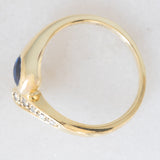 Anello a serpente vintage in oro giallo 14K con zaffiro e diamanti, anni ‘70