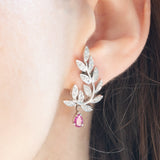 Orecchini vintage in oro bianco 18K con rubini (0.80ctw ca.) e diamanti (1ctw ca.), anni ‘90