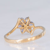 Anello contrarier con fiore in oro giallo 9K con tanzaniti (0.36ctw ca.) e diamante, anni ‘90