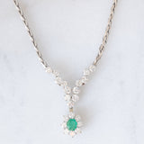 Collier vintage in oro bianco 18K con smeraldo (0.40ct ca.) e diamanti di taglio brillante (2.10ctw ca.), anni ‘80