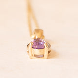 Collana vintage con catenina in oro giallo 9K e con ciondolo in oro giallo e bianco 9K con ametista (0.35ct ca.) e diamanti, anni ‘70