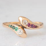 Anello contrarier antico a doppio serpente in oro giallo 14K con smeraldi, rubini e diamanti di taglio vecchio (0.16ctw ca.), anni ‘20