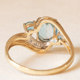 Anello vintage in oro giallo e bianco 9K con topazi azzurri (1.30ctw ca.) e diamanti, anni ‘90/anni ‘2000