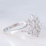 Anello a fiore vintage in platino con diamanti (0.55ctw), anni ‘80