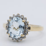 Anello a margherita vintage in oro giallo 9K con acquamarina (2ct ca.) e diamanti (0.18ctw ca.), anni 2000