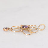 Pendente antico lavalier in oro giallo 9K con ametiste (0.60ctw ca.) e con decorazioni a foglie, anni ‘10/‘20