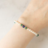 Braccialetto vintage con perle bianche, lapislazzuli, malachite e con dischi e chiusura in oro giallo 14K, anni ‘70
