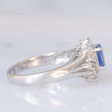 Anello margherita vintage in platino con zaffiro (0.75ct) e diamanti (0.31ctw), anni ‘80