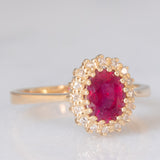 Anello a margherita vintage in oro giallo 14K con rubino (1.50ct ca.) e diamanti (0.16ctw ca.), anni ‘70/‘80