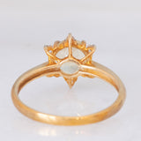 Anello “sole” in oro giallo 9K con apatite verde (1.19ct) e zaffiri bianchi