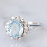 Anello a margherita vintage in platino con acquamarina (1.09ct) e diamanti (0.10ctw), anni ‘80/‘90