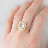 Anello a margherita vintage in oro giallo 14K con acquamarina (3.30ct ca.) e diamanti (0.22ctw ca.), anni ‘70